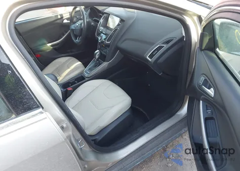 2017 Ford Focus Titanium z USA, uszkodzony, nr VIN 1FADP3N22HL252244